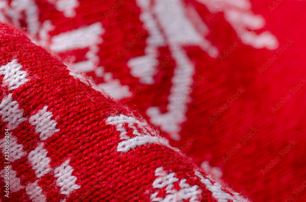 Plaid warm white red fabric texture material new year on blur background Plaid warm white red fabric texture material new year on blur background