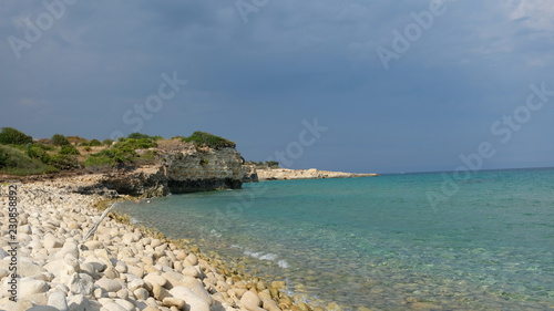 Amazing beach at the Ionian Sea, in the province of Syracuse, Sicily. The beach is part of the Oriented Nature Reserve Cavagrande.