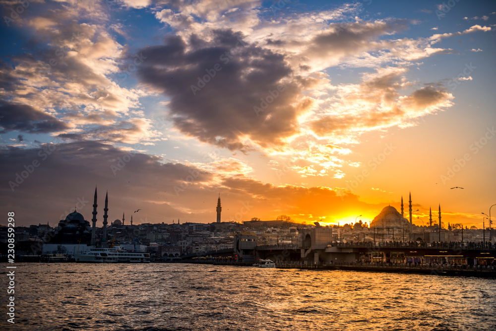 sunset istanbul. Suleymaniye mosque and Galata bridge background