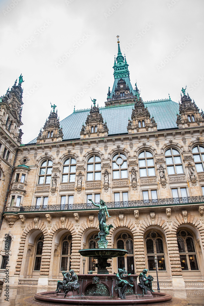 Hygieia fountain in the courtyard of Hamburg City Hall  in a cold rainy early spring day