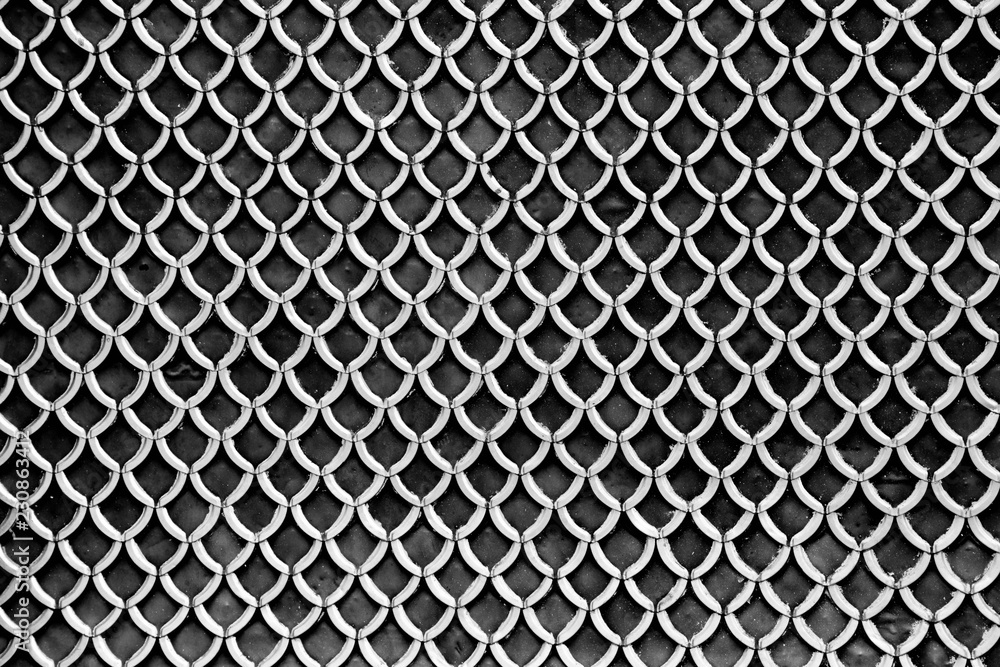 old ceramic tile roof pattern at antique temple - monochrome old ceramic tile roof pattern at antique temple - monochrome
