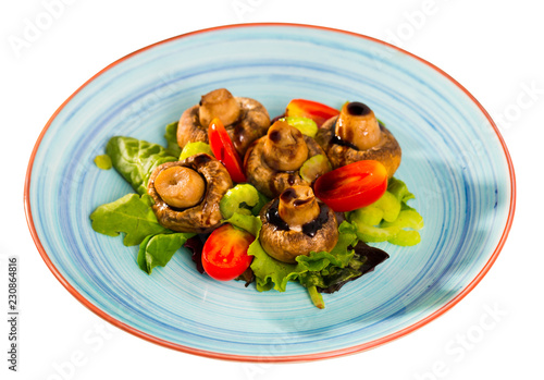 Champignons marinated in soy sauce with balsamic, served with vegetables photo