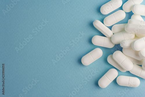 Vászonkép multi colored and white pills are on the table