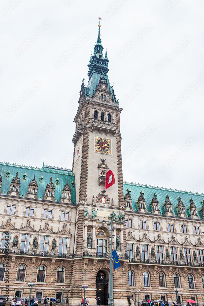 Hamburg City Hall building located in the Altstadt quarter in the city center at the Rathausmarkt square in a cold rainy early spring day