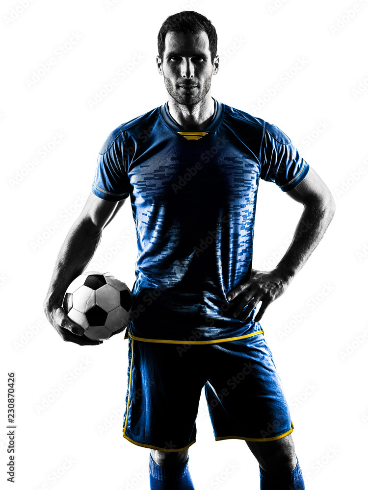 Naklejka premium one caucasian soccer player man standing in silhouette isolated on white background