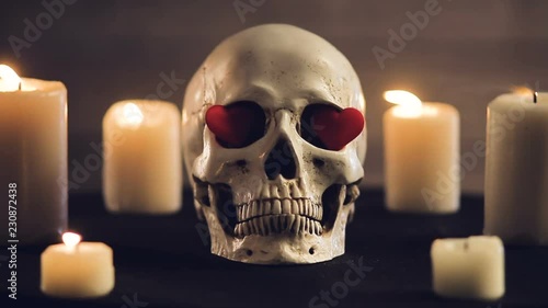 Magic ritual with skull and hearts
