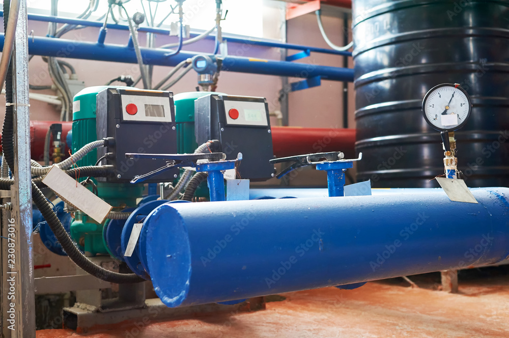 Blue engine with a pump and a frequency converter connected to the blue pipes. Blue engine with a pump and a frequency converter connected to the blue pipes.