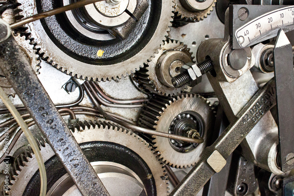 mechanical gears inside machine Stock Photo
