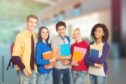 Group of Students with books isolated on white background