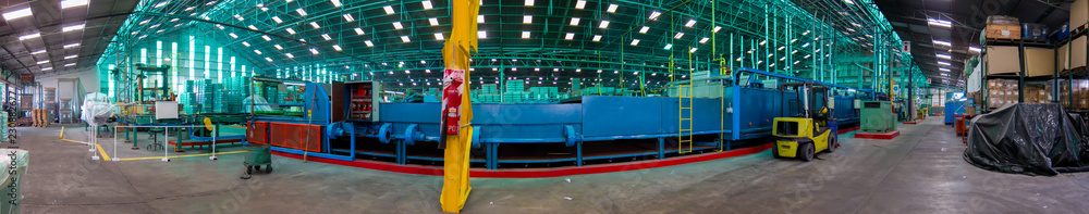 Factory interior panoramic view. Blue lehr