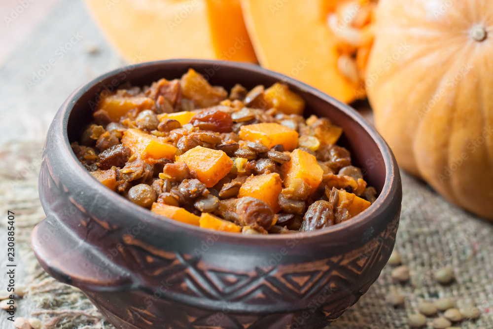 Spicy curry with green lentils, pumpkin and raisins Spicy curry with green lentils, pumpkin and raisins