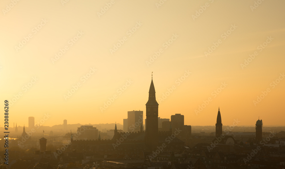 Obraz premium City of Copenhagen, Denmark. Beautiful evening light with backlit buildings.