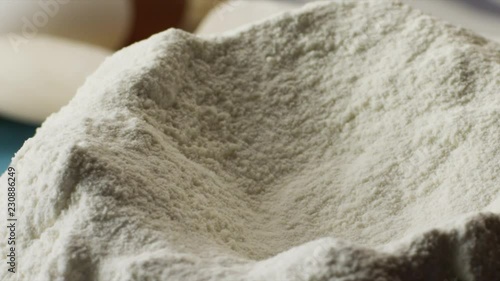 Close-up flour. Scene. Concept of cooking. Preparation of homemade cakes from white flour photo