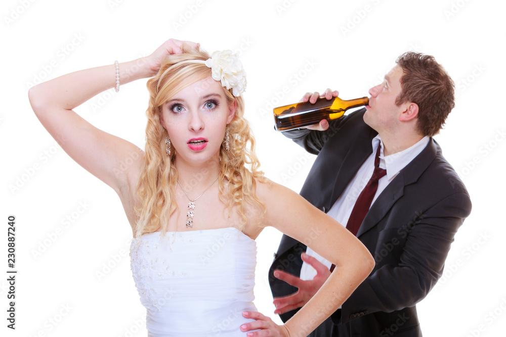 Bride having argument with drunk alcoholic groom Bride having argument with drunk alcoholic groom