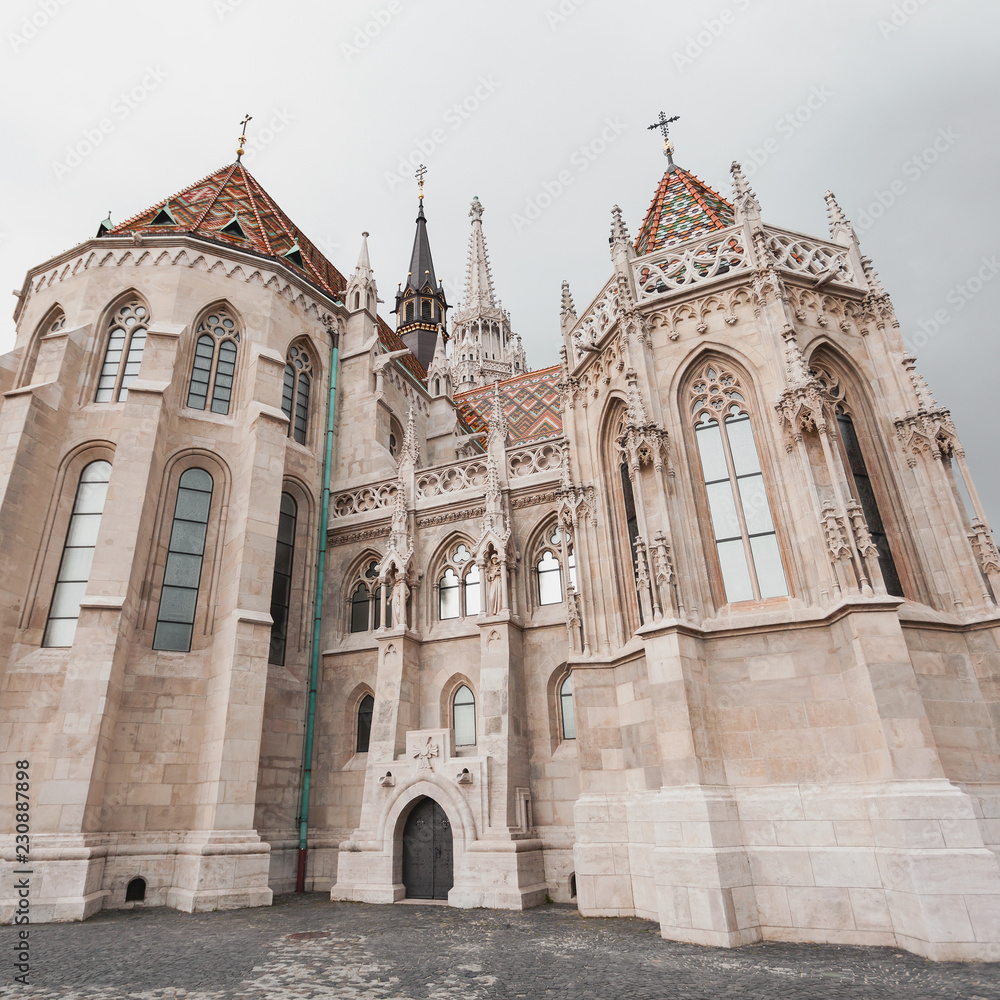 St. Matthias Church in the Fisherman's Bastion in Budapest, Hungary. Cloudy weather, dramatic sky
