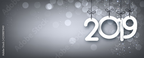 Silver shiny 2019 New Year banner. Bokeh effect.
