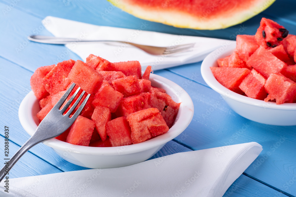 Watermelon cut into cubes on a plate Watermelon cut into cubes on a plate