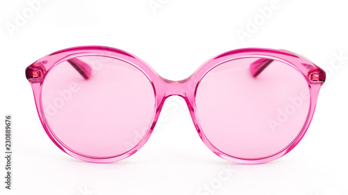 Pink sun glasses on white background