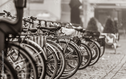 Photography Group of bikes in parking in Amsterdam