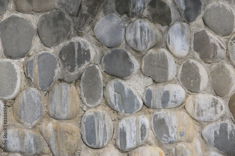 Grey natural stone wall