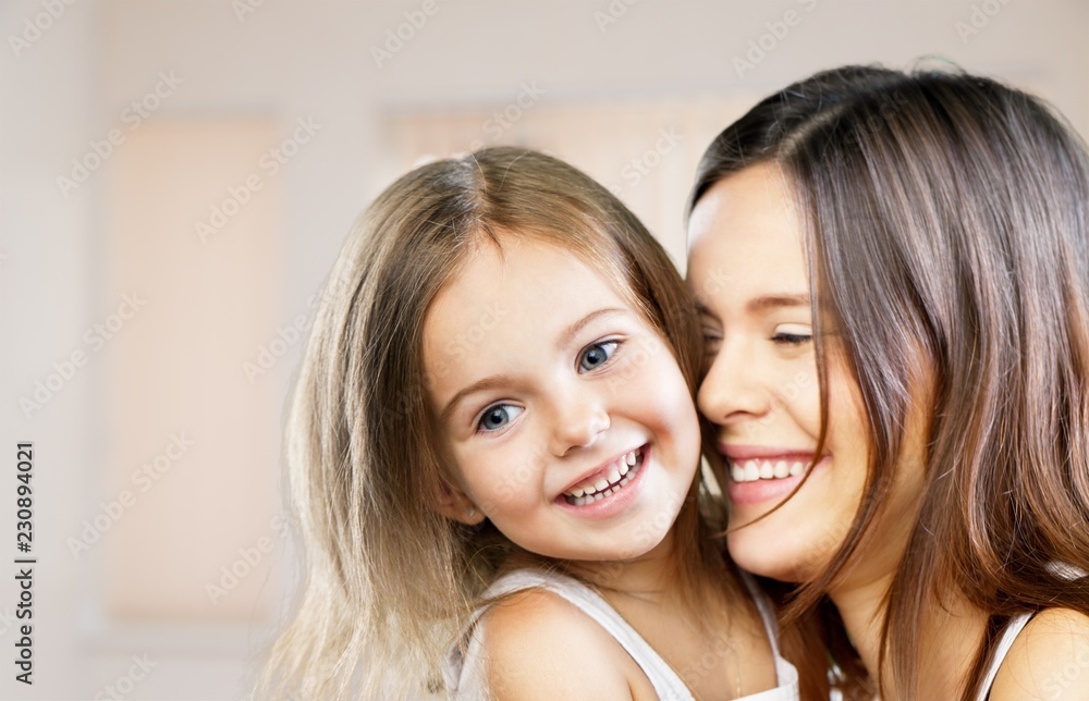 Happy Mother and daughter hugging Happy Mother and daughter hugging