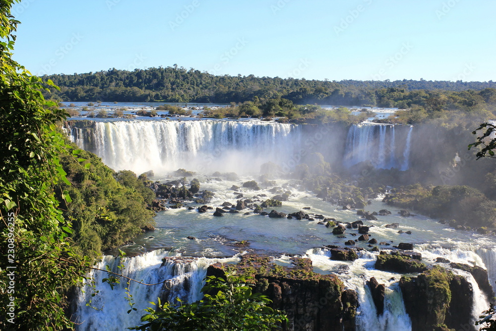Fototapeta premium Waterfall on the river in light fog