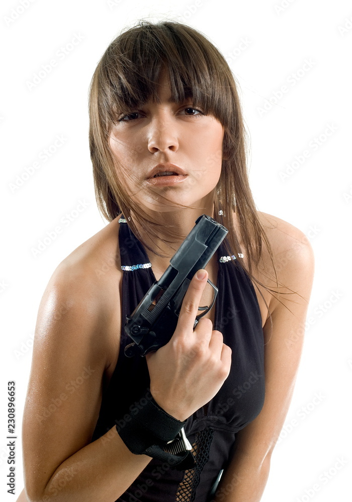 Beautiful girl with gun on white background is insulated Beautiful girl with gun on white background is insulated