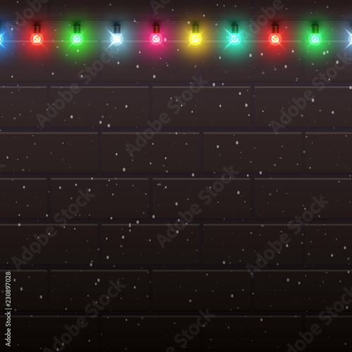 Festive brickwork background with colorful decorative lanterns and snow for Christmas and New Year design.
