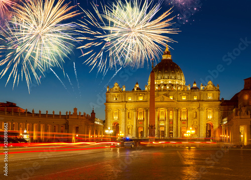 St. Peter's square and cathedral in Rome at night with fireworks, Italy