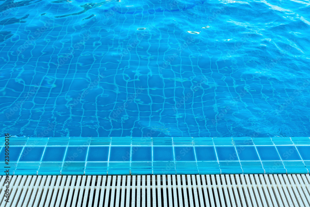 Overflow grating of swimming water pool.