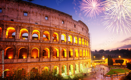 Canvas Print view of Colosseum illuminated at night with fireworks in Rome, Italy