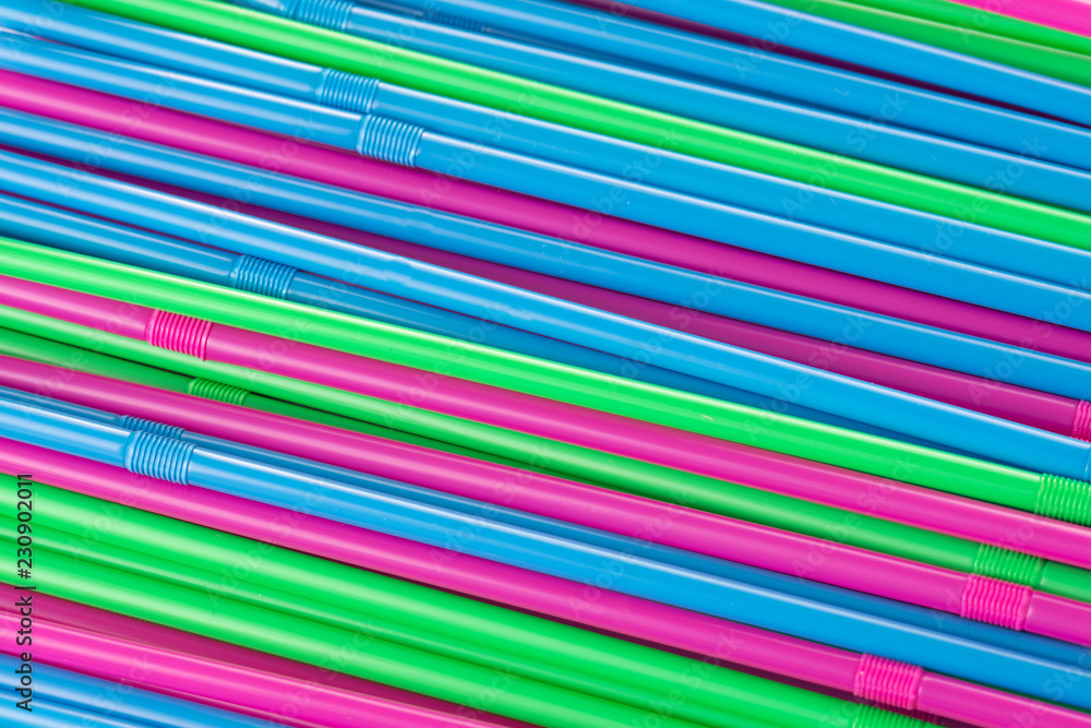 Flat stack of plastic drinking straws