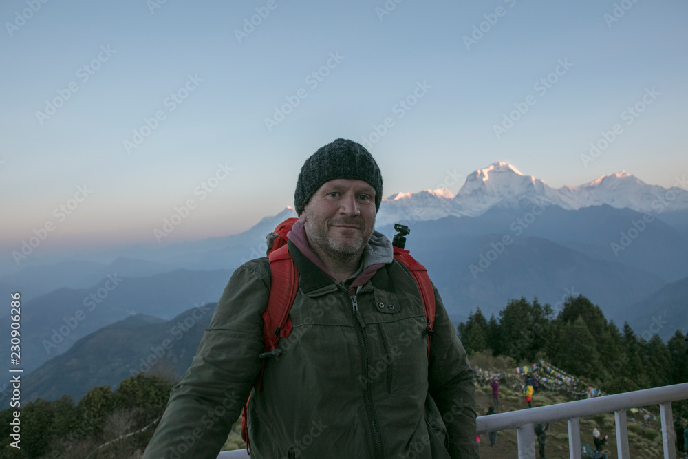 european wanderer at poon hill, nepal european wanderer at poon hill, nepal