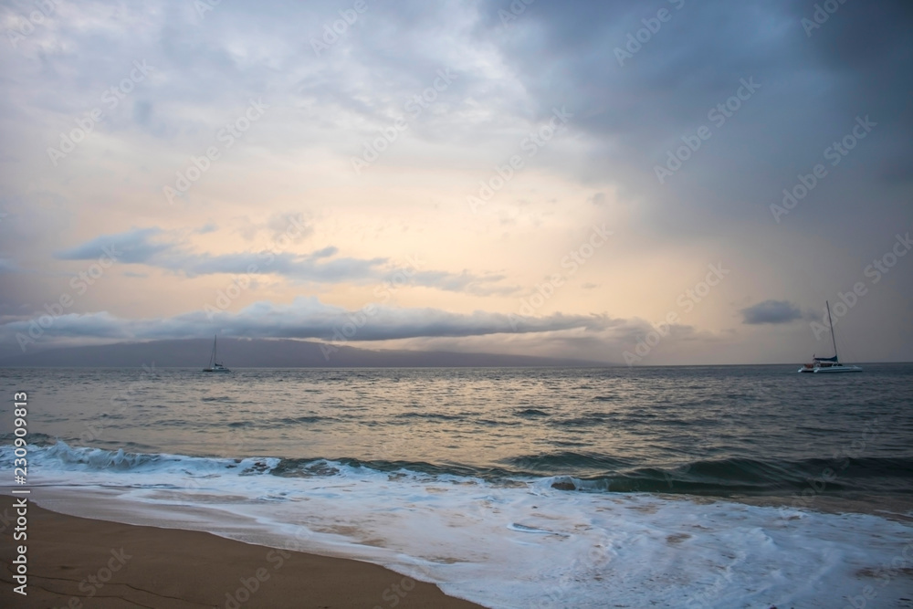 Boats on Horizon under Cloudy Sunset Seascape with Hurricane Approaching
