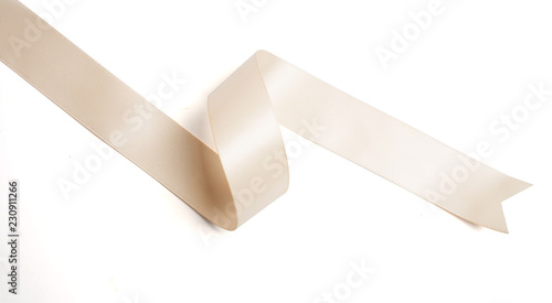 cream ribbon in roll on white