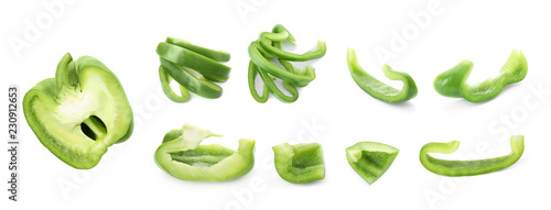 Set of sliced green bell peppers on white background