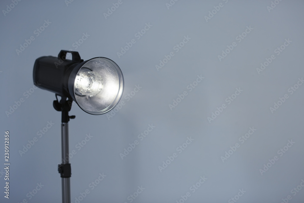 Studio lighting against gray background. Professional photo equipment Studio lighting against gray background. Professional photo equipment