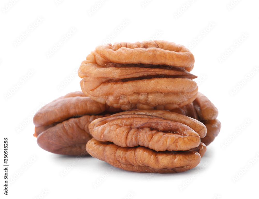 Heap of ripe shelled pecan nuts on white background Heap of ripe shelled pecan nuts on white background