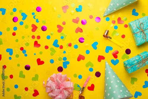 Gifts with confetti for the holiday. Top view with an empty place for inscription or advertising.