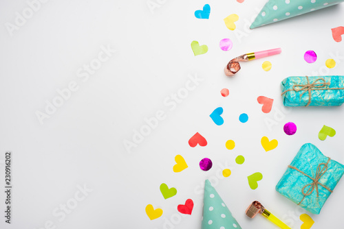 Gifts with confetti for the holiday. Top view with an empty place for inscription or advertising.