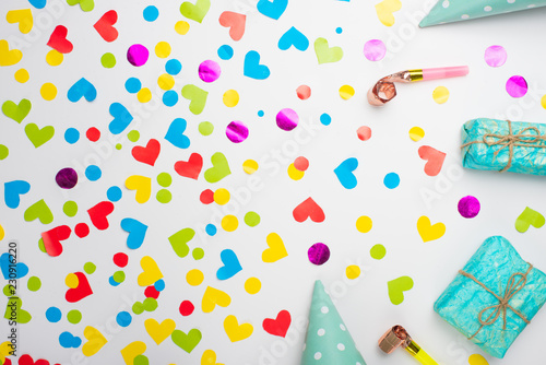 Gifts with confetti for the holiday. Top view with an empty place for inscription or advertising.