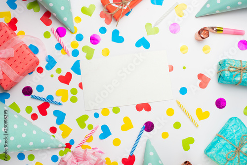 Gifts with confetti for the holiday. Top view with an empty place for inscription or advertising.