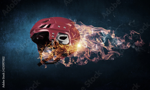 Fototapeta Naklejka Na Ścianę i Meble -  Burning sport helmet