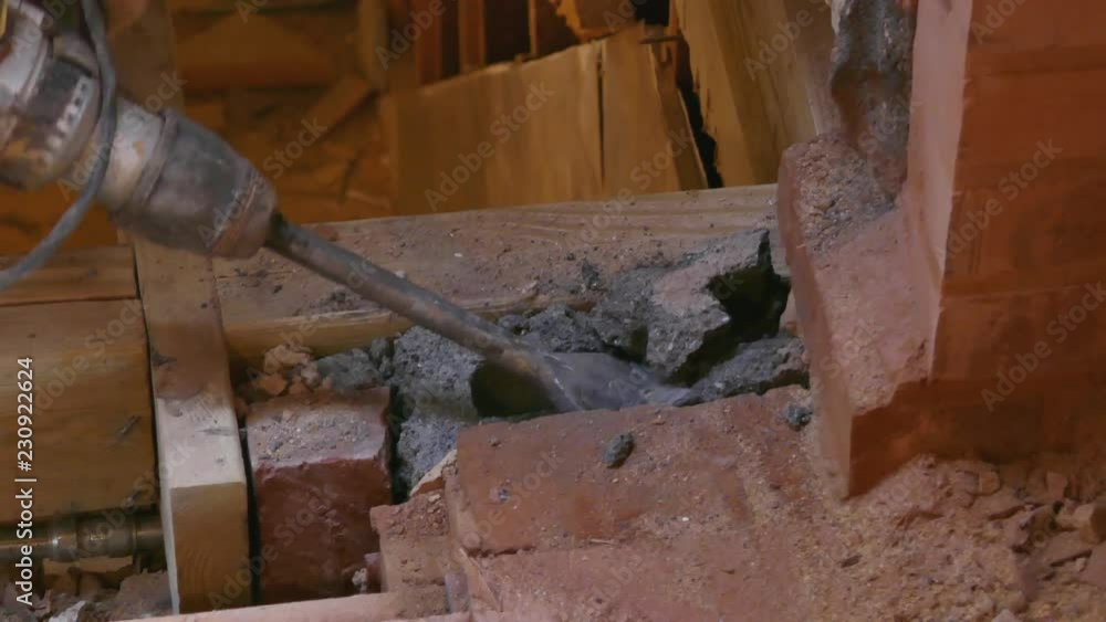 Construction work - demolishing a concrete block 4K Construction work - demolishing a concrete block 4K
