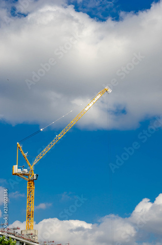 Construction of office building with tower cranes.