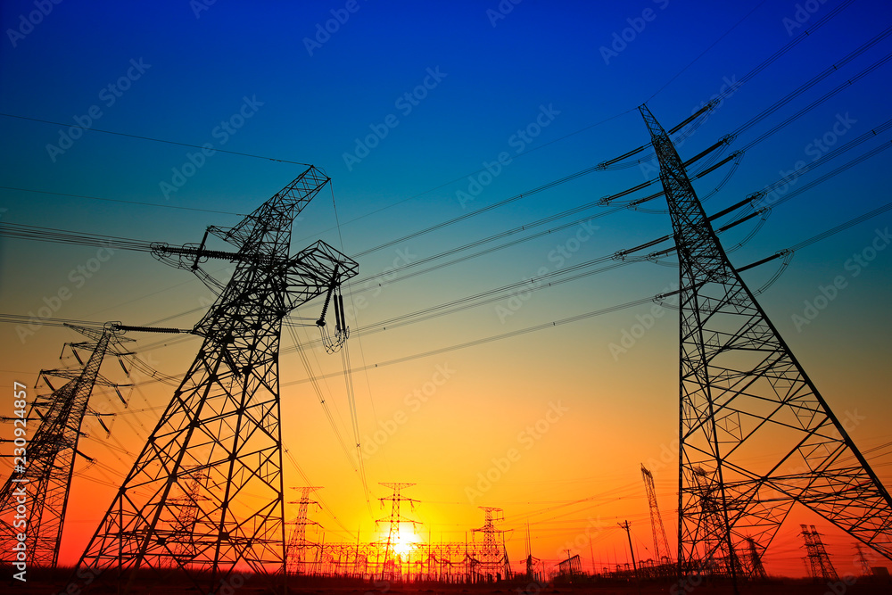 Fototapeta premium Pylon, high-voltage tower sky background.