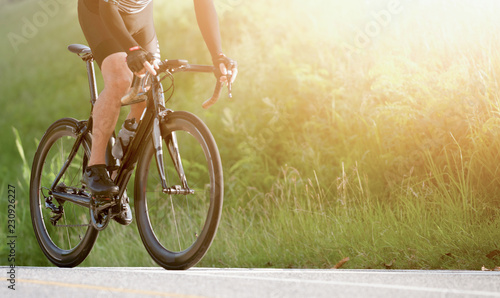 Racing Bike.Ride on bike on the road. Sport and active life concept in the summer time © peampath