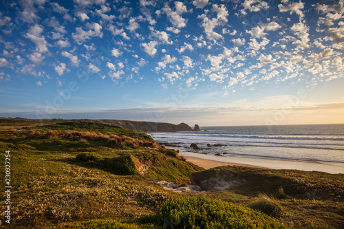 Cape Woolamai beach, looking towards the Pinnacles rock formation at sunset; Phillip Island, Victoria, Australia