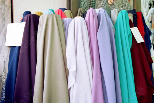 Beautiful of Satin has many colors as follows indigo, purple, violet, cream, brown, yellow, cyan, green, green, white, gray, grey, red. Fabric pastel color sell on market. Cloth texture background.