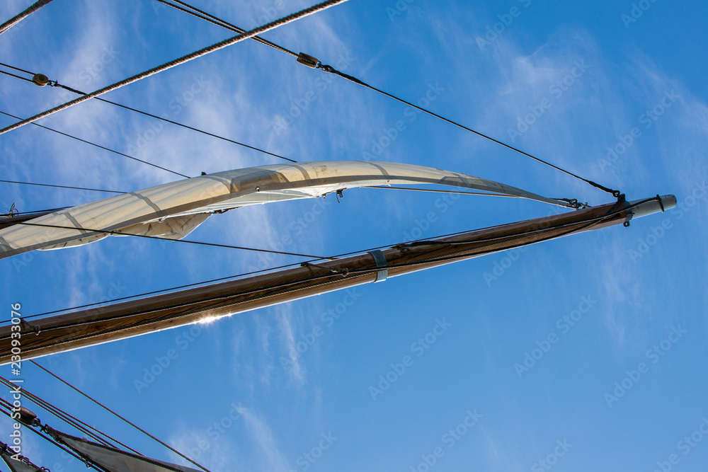 Φωτογραφία Looking at a furled sail and rigging of a 3-masted schooner on its way to the Island of Nicklösa in the Åland Islands, Finland